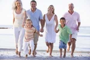 family walking on beach after estate planning in wisconsin