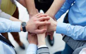 hands of family business where they are doing business succession planning